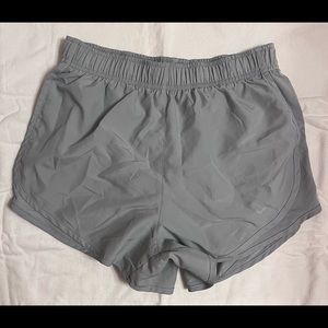 Grey women’s Nike running shorts.